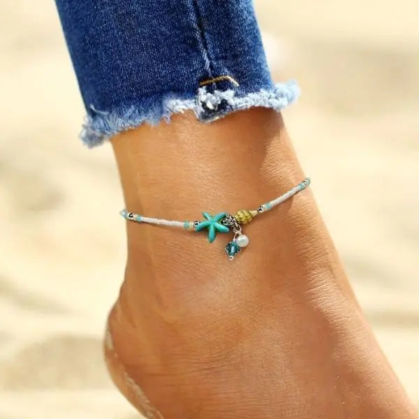 Tobillera boho de star de mar turquesa con conchas y abalorios
