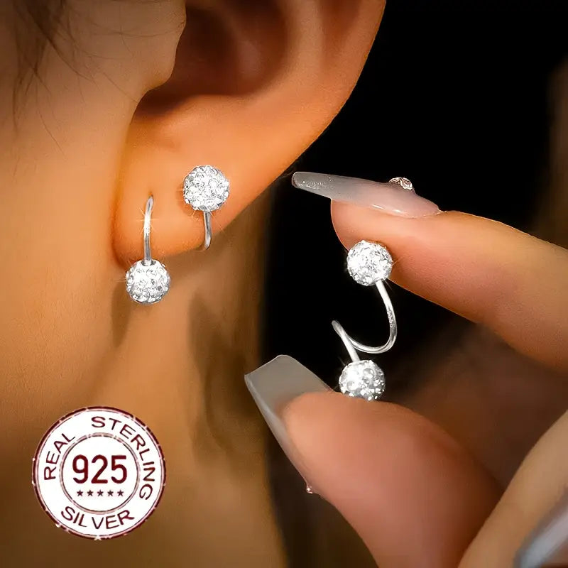 Pendientes de circonitas de doble espiral con bolas brillantes