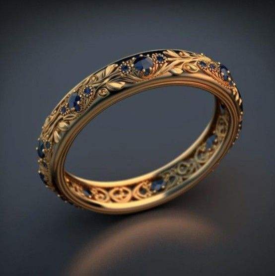 Anillo Eternity Botánico en Oro con Circonia Cúbica Azul