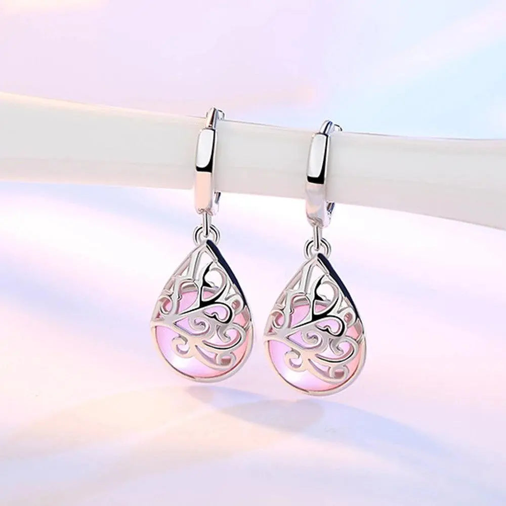 Pendientes elegantes en forma de lágrima con piedra rosa y estampado de filigrana