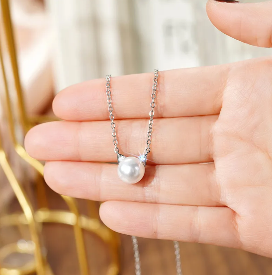 Elegante conjunto de joyas con orejas de gato y perlas de metal pulido