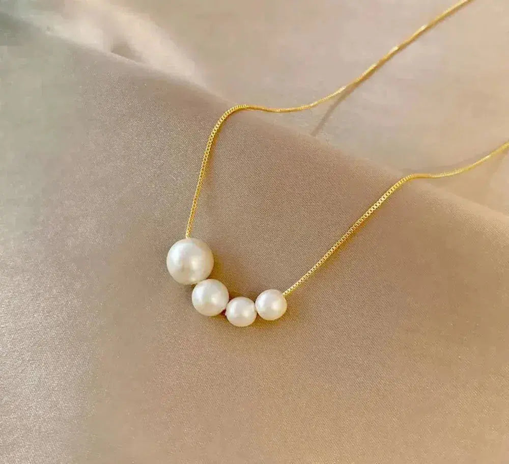 Delicado collar de perlas con perlas de agua dulce graduadas
