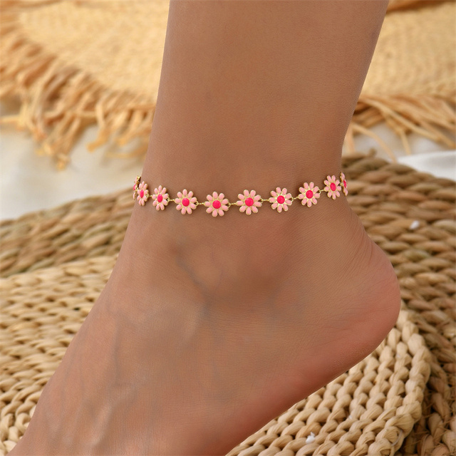Tobillera con diseño de margaritas y flores esmaltadas en rosa para mujer