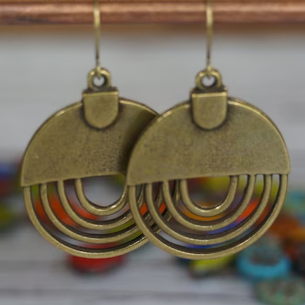 Pendientes de bronce antiguo con diseño de rayos de sol