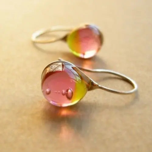 Pendientes vintage con cálidas gotas de vidrio degradado