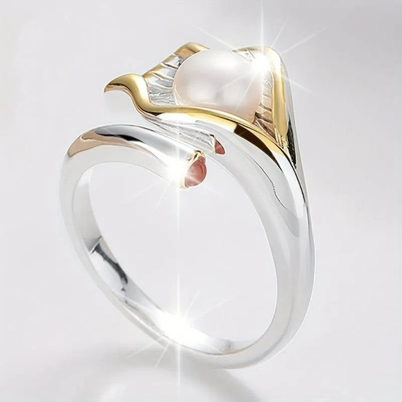 Elegante anillo abierto con perla brillante y rubí