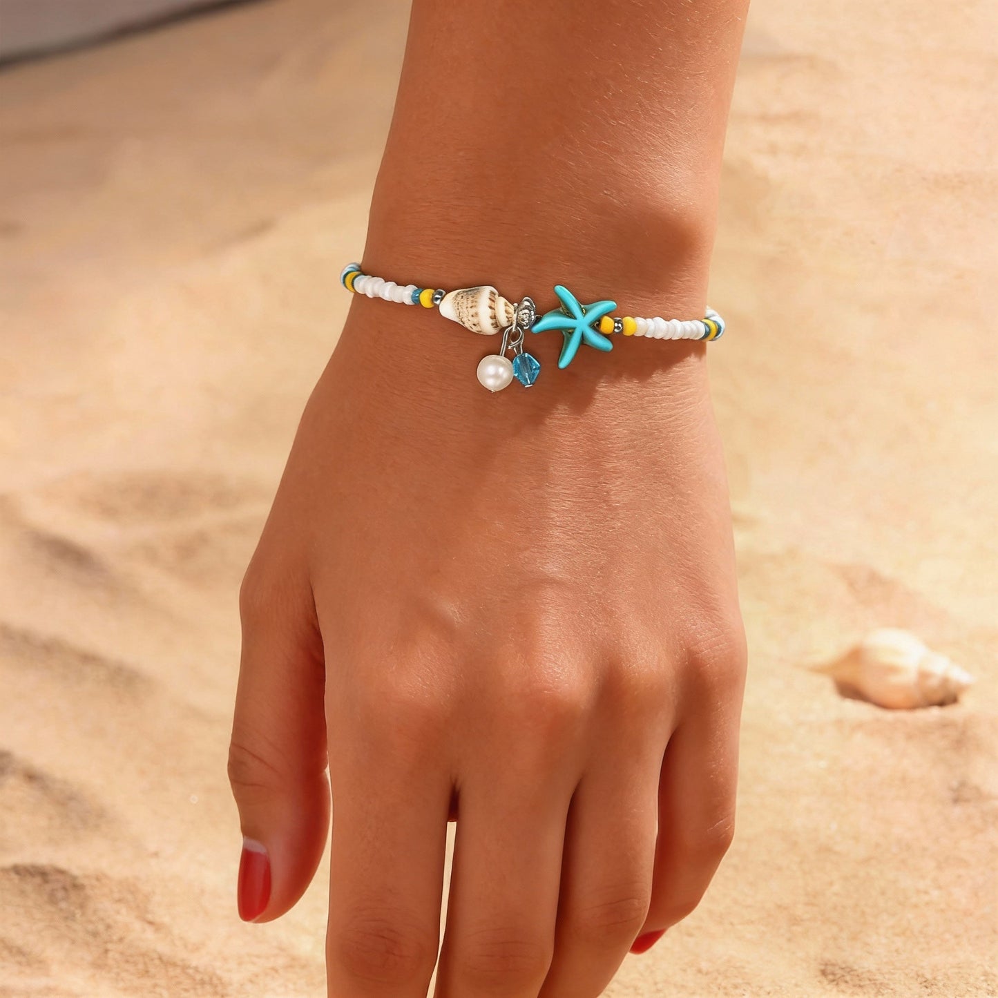 Tobillera de cuentas de playa con concha de estrella de mar y colgantes