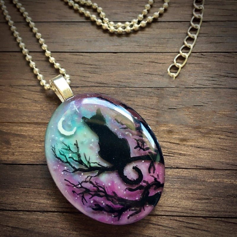 Collar de gato de ensueño con brillante cielo nocturno y colgante de luna