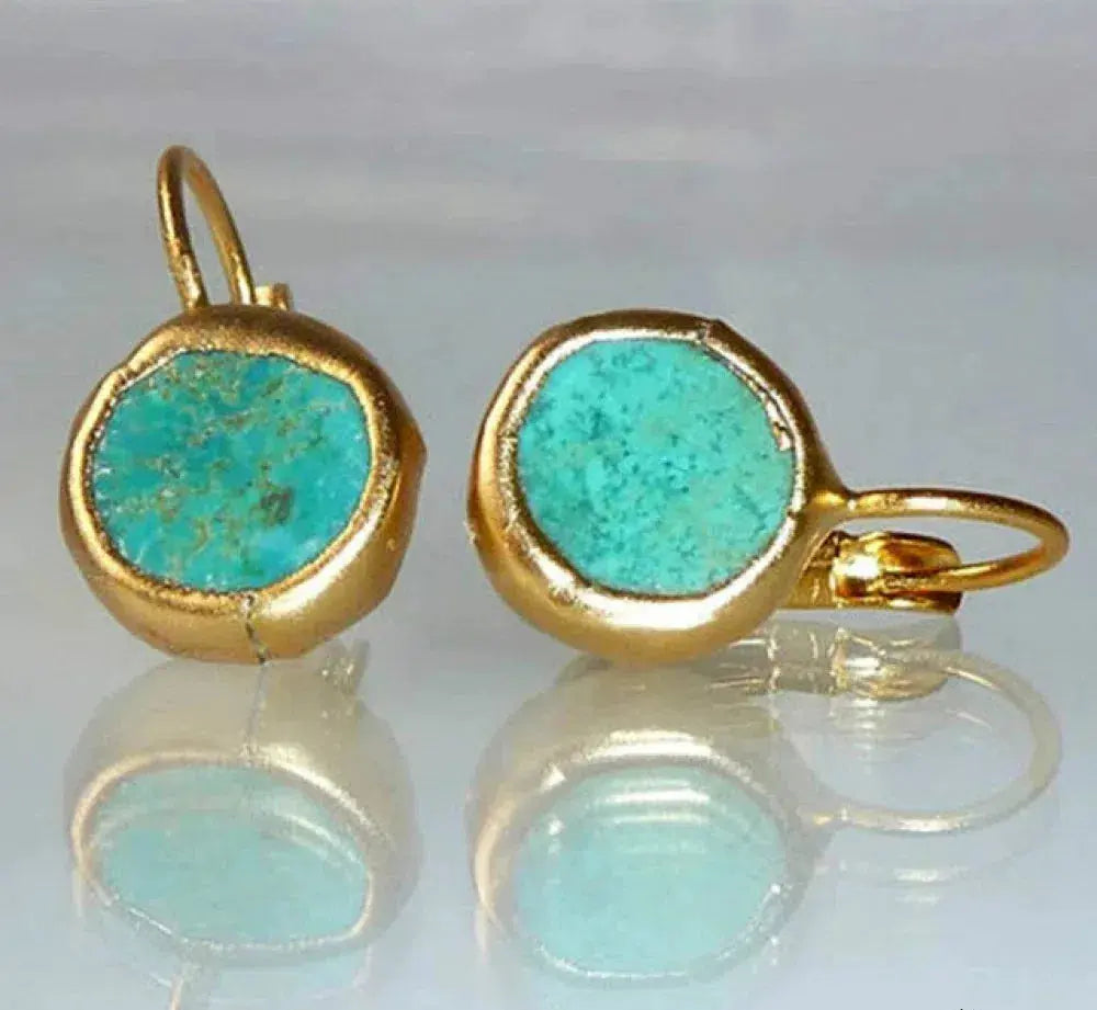 Pendientes turquesa estilo vintage con elegante marco dorado