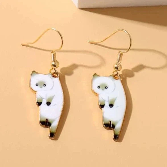 Lindos pendientes de gato de dibujos animados con un divertido diseño colgante