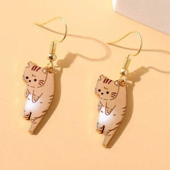 Lindos pendientes de gato de dibujos animados con un divertido diseño colgante