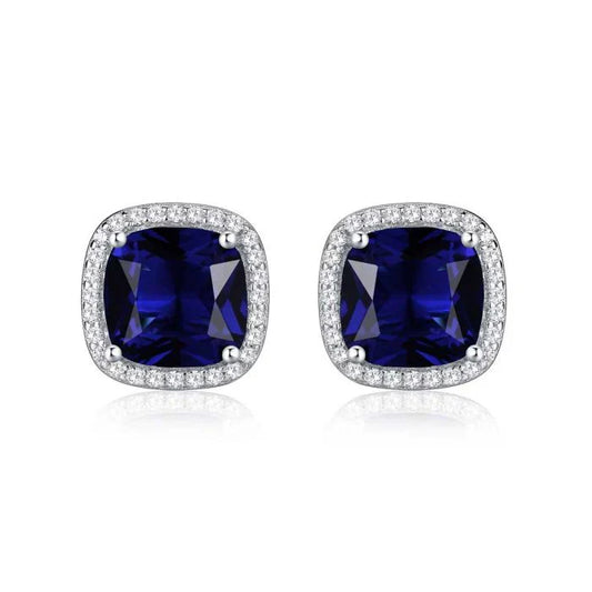Elegantes pendientes de zafiro con halo de circonita cúbica de talla cojín