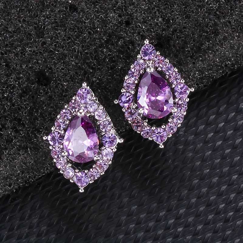 Elegante conjunto de joyas en forma de lágrima de amatista morada con collar y pendientes