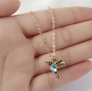 Conjunto de joyas de colibrí con detalles de piedras preciosas brillantes para mujer