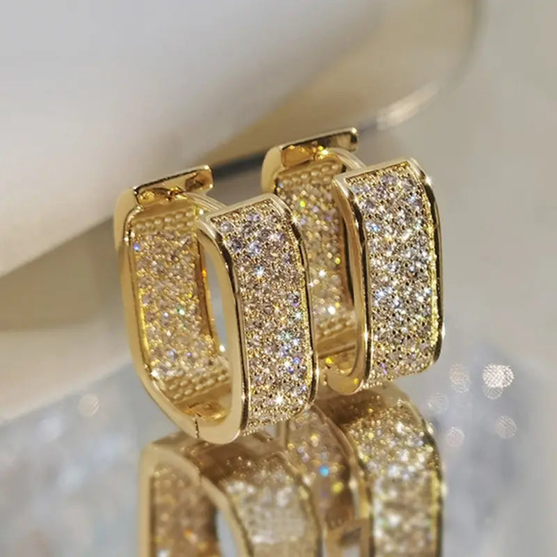 Pendientes brillantes en forma de U con diseño de pavé de cristal brillante