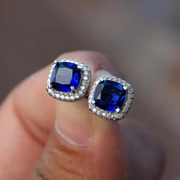 Elegantes pendientes de zafiro con halo de circonita cúbica de talla cojín