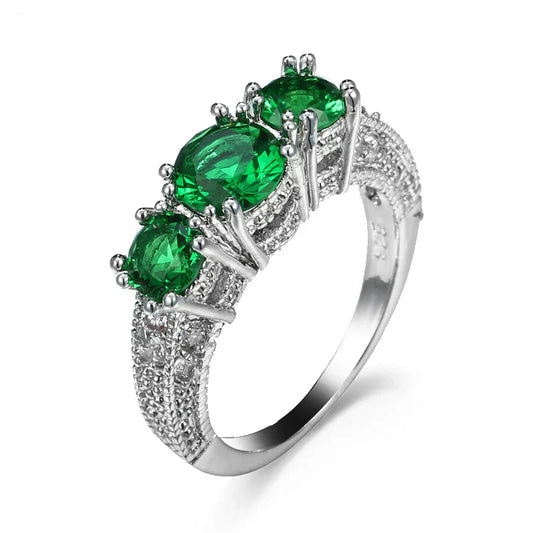 Anillo con 3 piedras esmeraldas