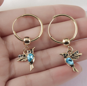 Conjunto de joyas de colibrí con detalles de piedras preciosas brillantes para mujer