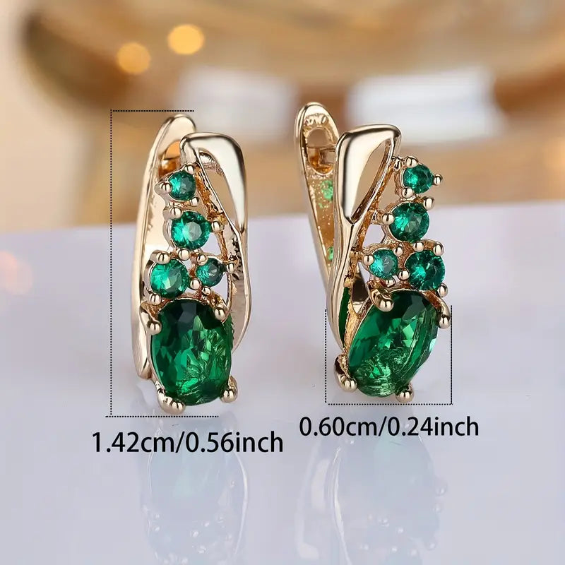 Pendientes elegantes con piedras verdes tipo esmeralda en tono dorado