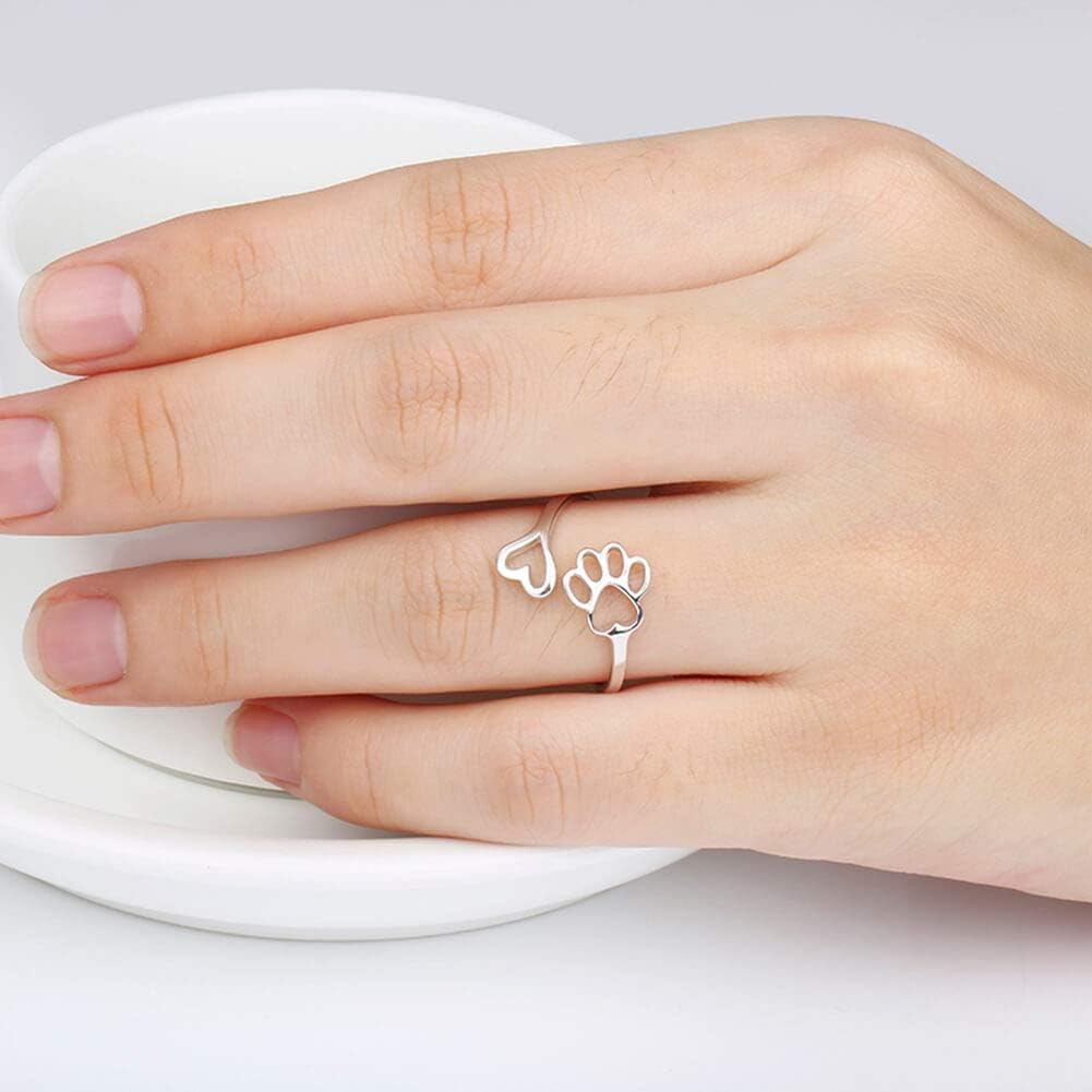 Anillo artesanal con pata y corazón