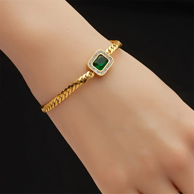 Elegante pulsera de cadena de serpiente con brillantes circonitas verde esmeralda