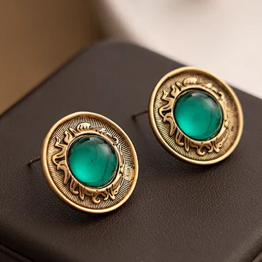 Pendientes vintage de cristal verde esmeralda con acabado antiguo