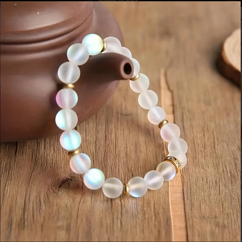 Pulsera de cuentas de piedra lunar iridiscente con detalles de circonitas brillantes