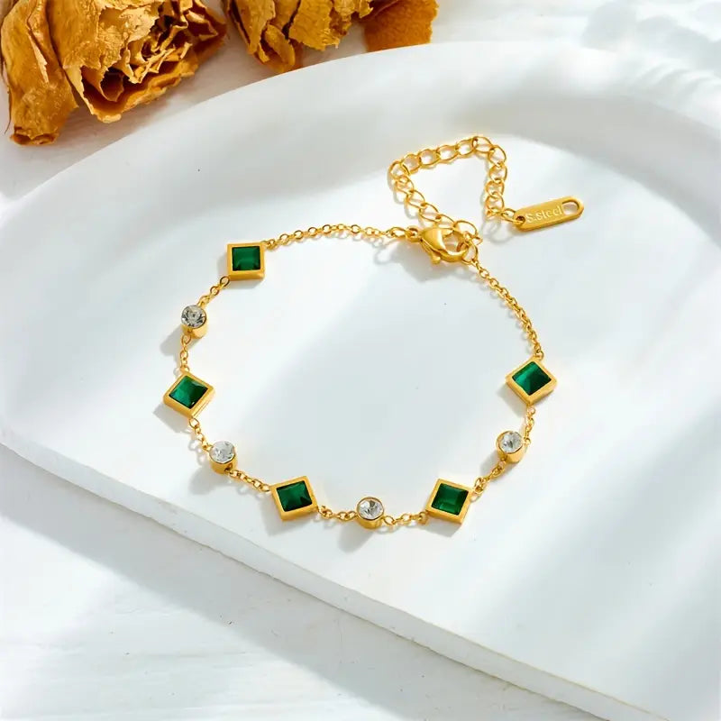Elegante pulsera con piedras cuadradas de esmeralda y circonitas