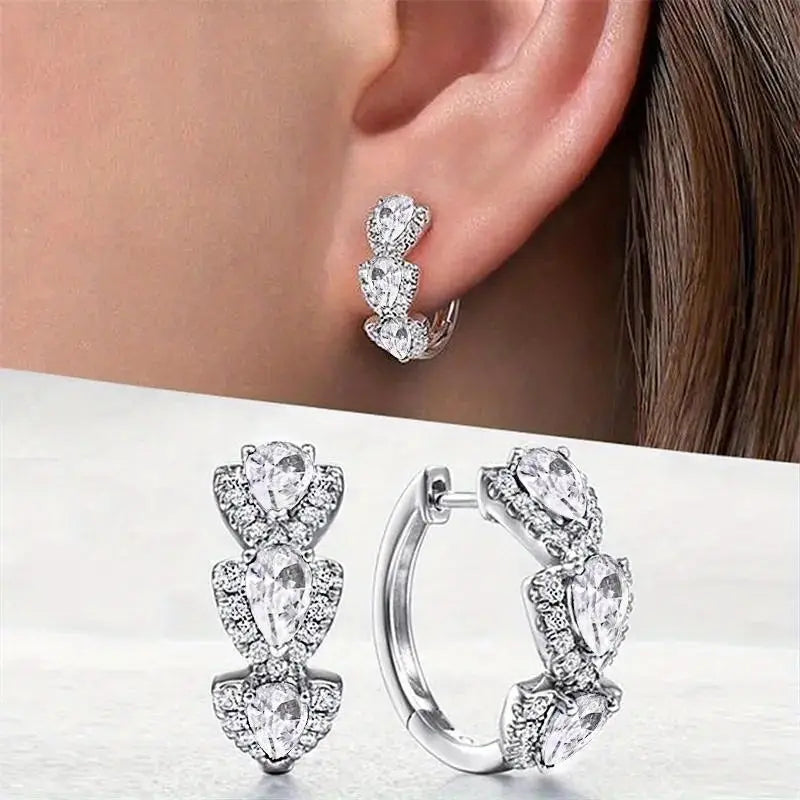 Pendientes elegantes en forma de lágrima con circonitas brillantes y cristales de colores