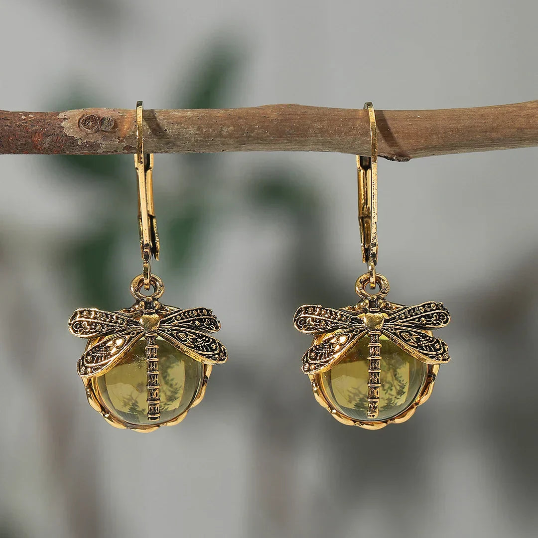 Pendientes de libélula con bolas de cristal brillantes en diferentes colores