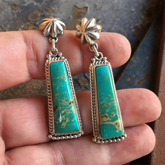 Pendientes vintage de color turquesa con detalles adornados en plata de primera ley