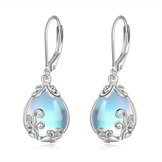Elegantes pendientes colgantes con piedra lunar azul y adornos celtas
