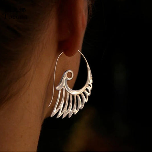 Pendientes de ala elegantes para un look boho ligero como una pluma
