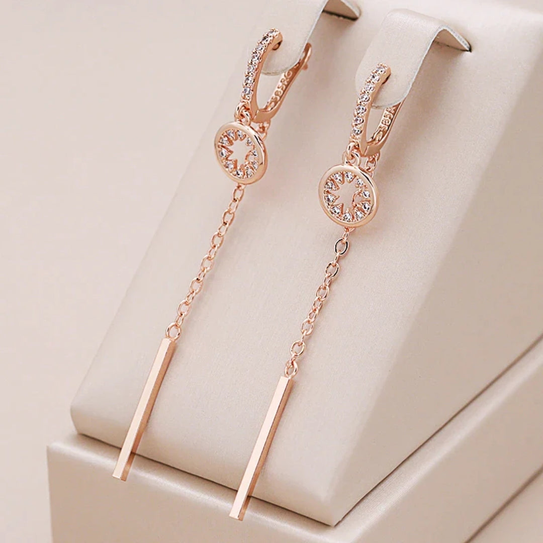 Glamurosos pendientes de oro rosa con brillantes diamantes de imitación y diseño de barra