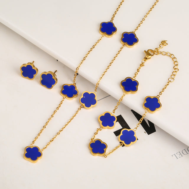 Elegante conjunto de joyas en forma de trébol con incrustaciones de piedras de colores