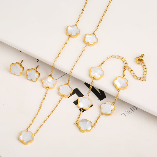 Elegante conjunto de joyas en forma de trébol con incrustaciones de piedras de colores