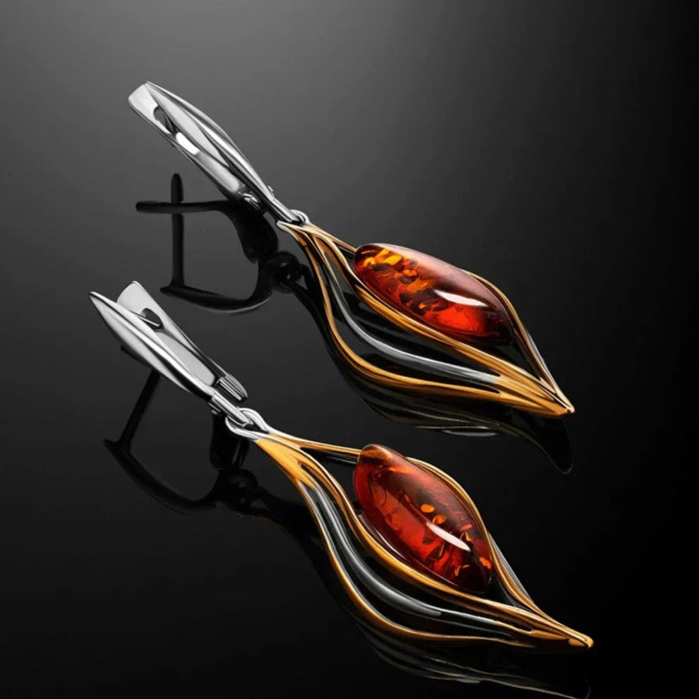 Pendientes elegantes con ámbar brillante y diseño ondulado