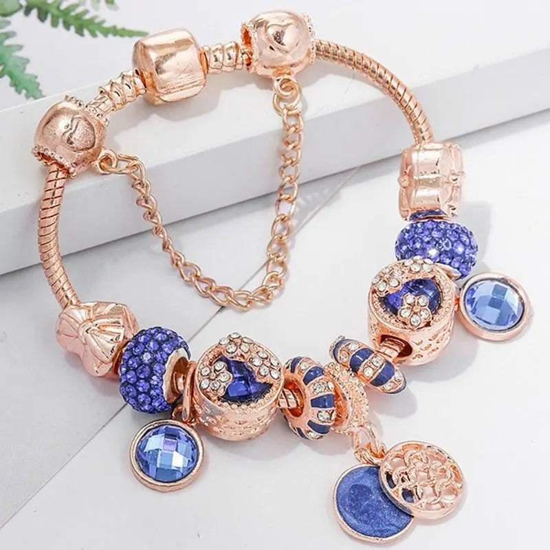 Pulsera con dos colores rosa y dos cristales azules brillantes