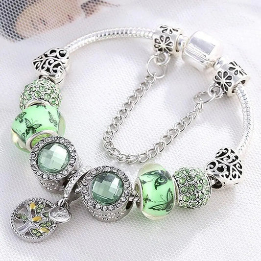 Pulsera con dos brillantes con cristales verdes y deliciosas mariposas
