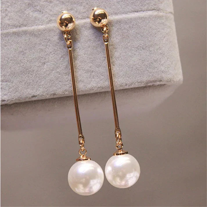 Pendientes de perlas elegantes: forma de lágrima larga con detalle de barra