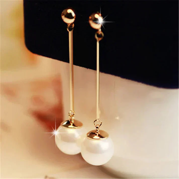 Pendientes de perlas elegantes: forma de lágrima larga con detalle de barra
