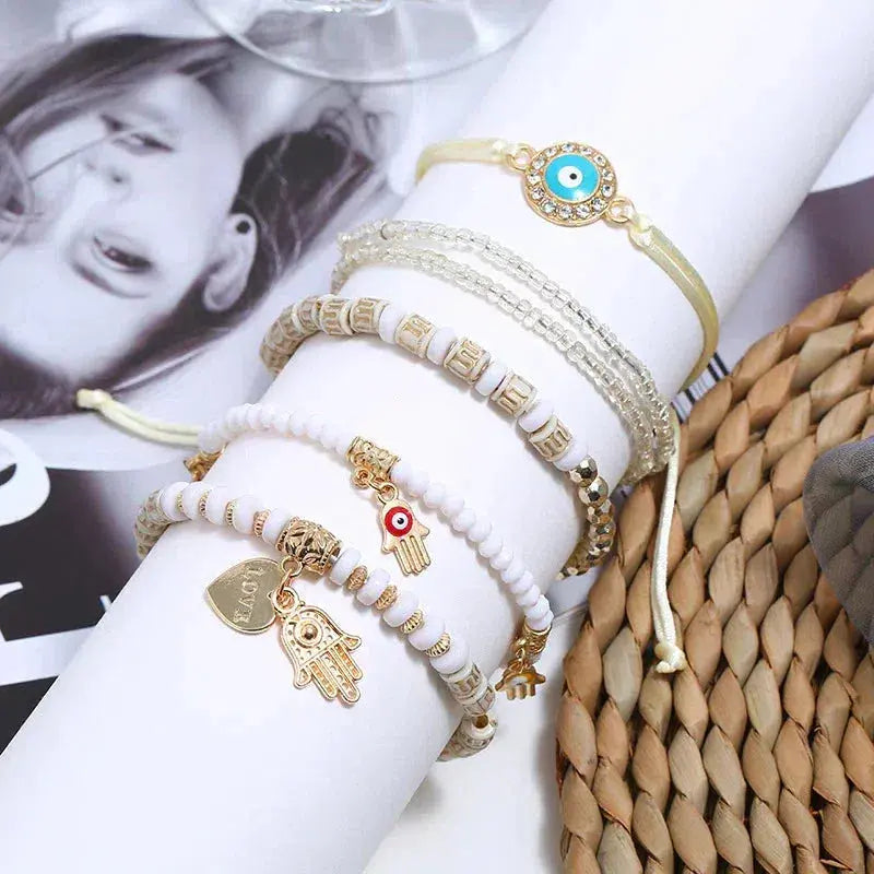 Conjunto de pulsera boho con ojo de Nazar, Hamsa y abalorios