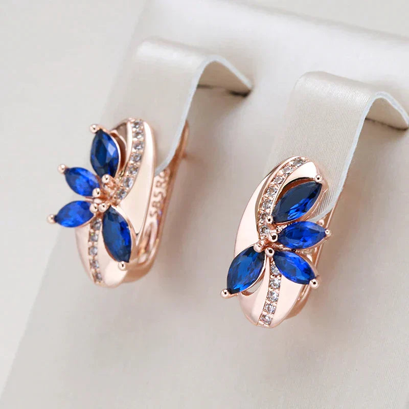 Pendientes color rosa con circonitas marquesa azules y cristales brillantes