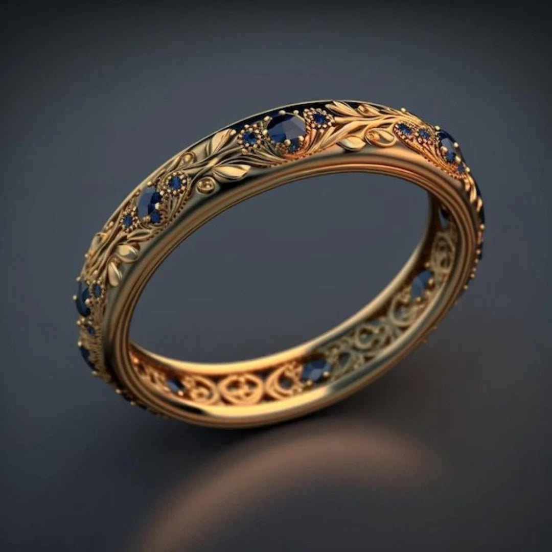 Anillo Eternity Botánico en Oro con Circonia Cúbica Azul