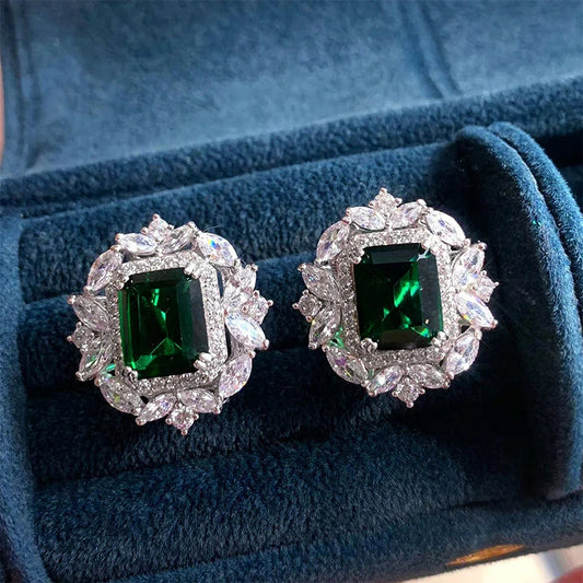 Pendientes lujosos con circonita verde esmeralda y piedras brillantes de talla marquesa