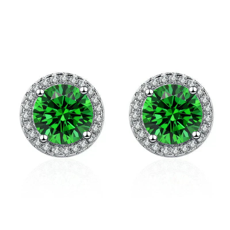 Pendientes brillantes de piedras preciosas de color verde esmeralda con halo de circonita cúbica