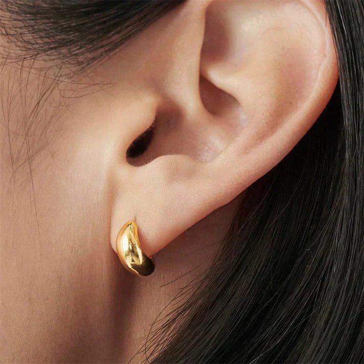 Pendientes colgantes de metal achaparrados de estilo moderno