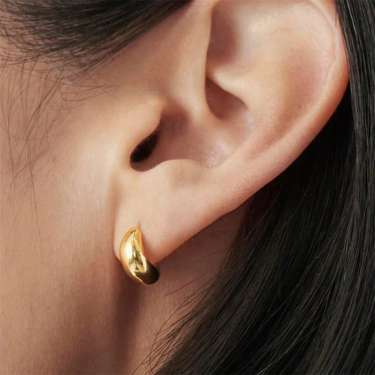 Pendientes colgantes de metal achaparrados de estilo moderno
