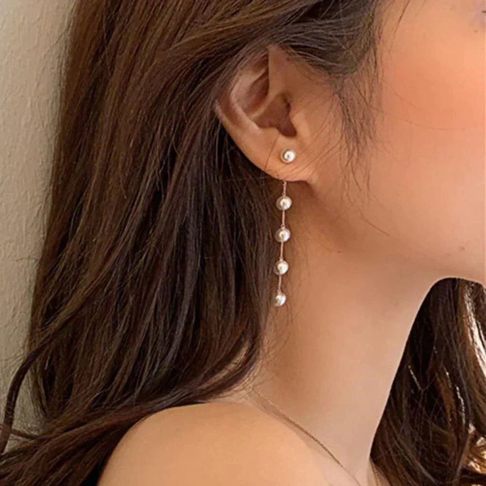 Pendientes de perlas elegantes con perlas brillantes