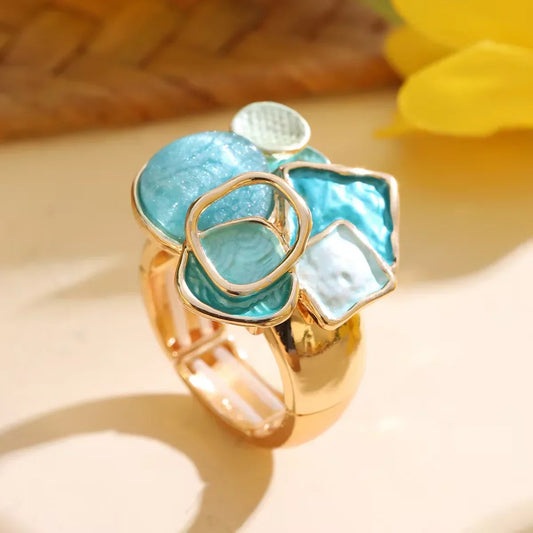 Anillo Multiforma con Piedras en Tonos Turquesa